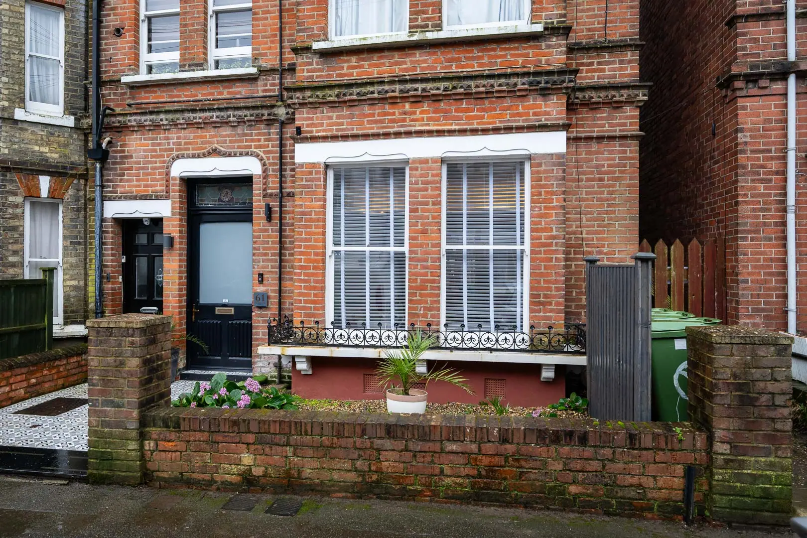 From the street the Victorian frontage is unchanged; the new work is all at the back.