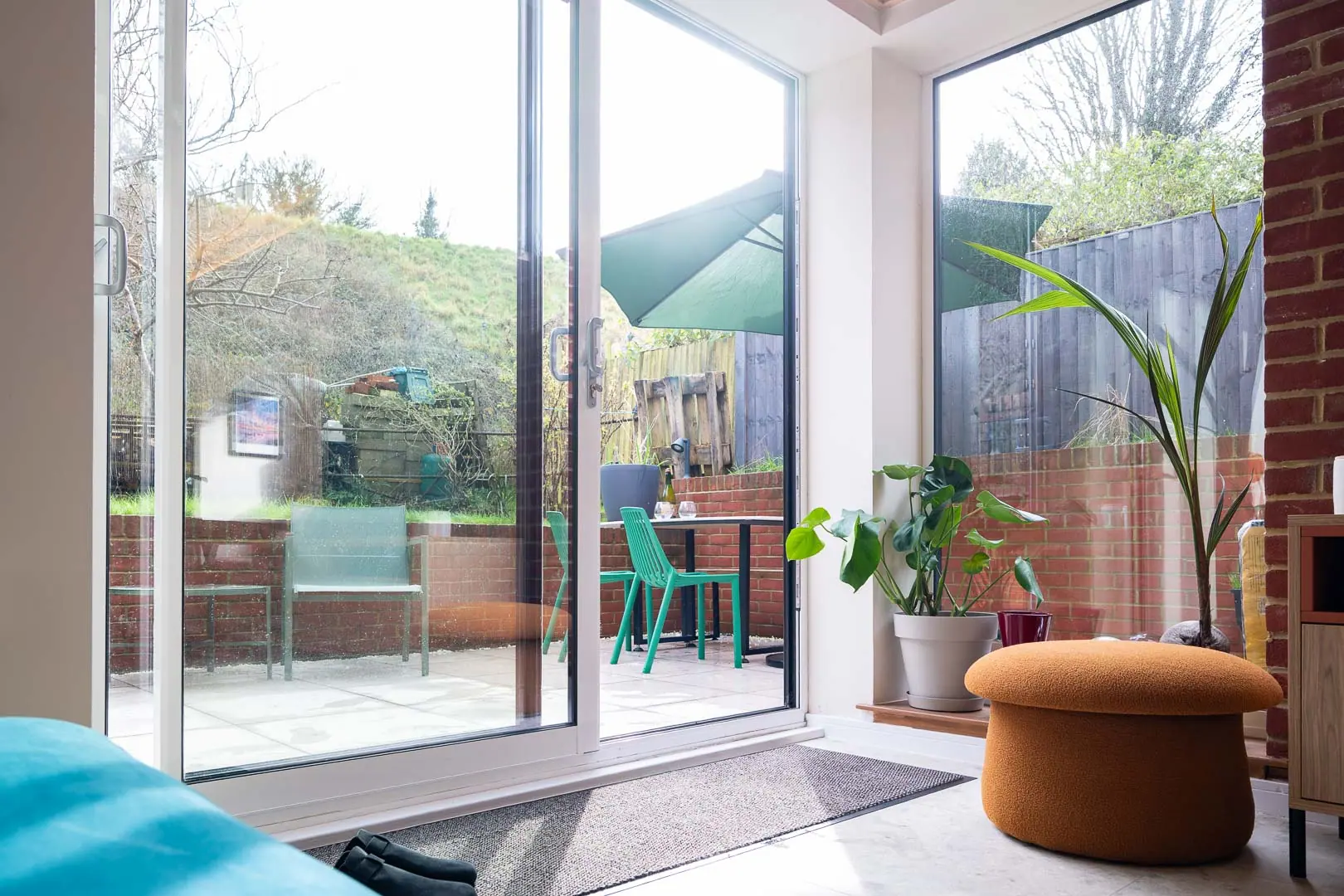 Sliding glazing opens the living space onto the terrace.