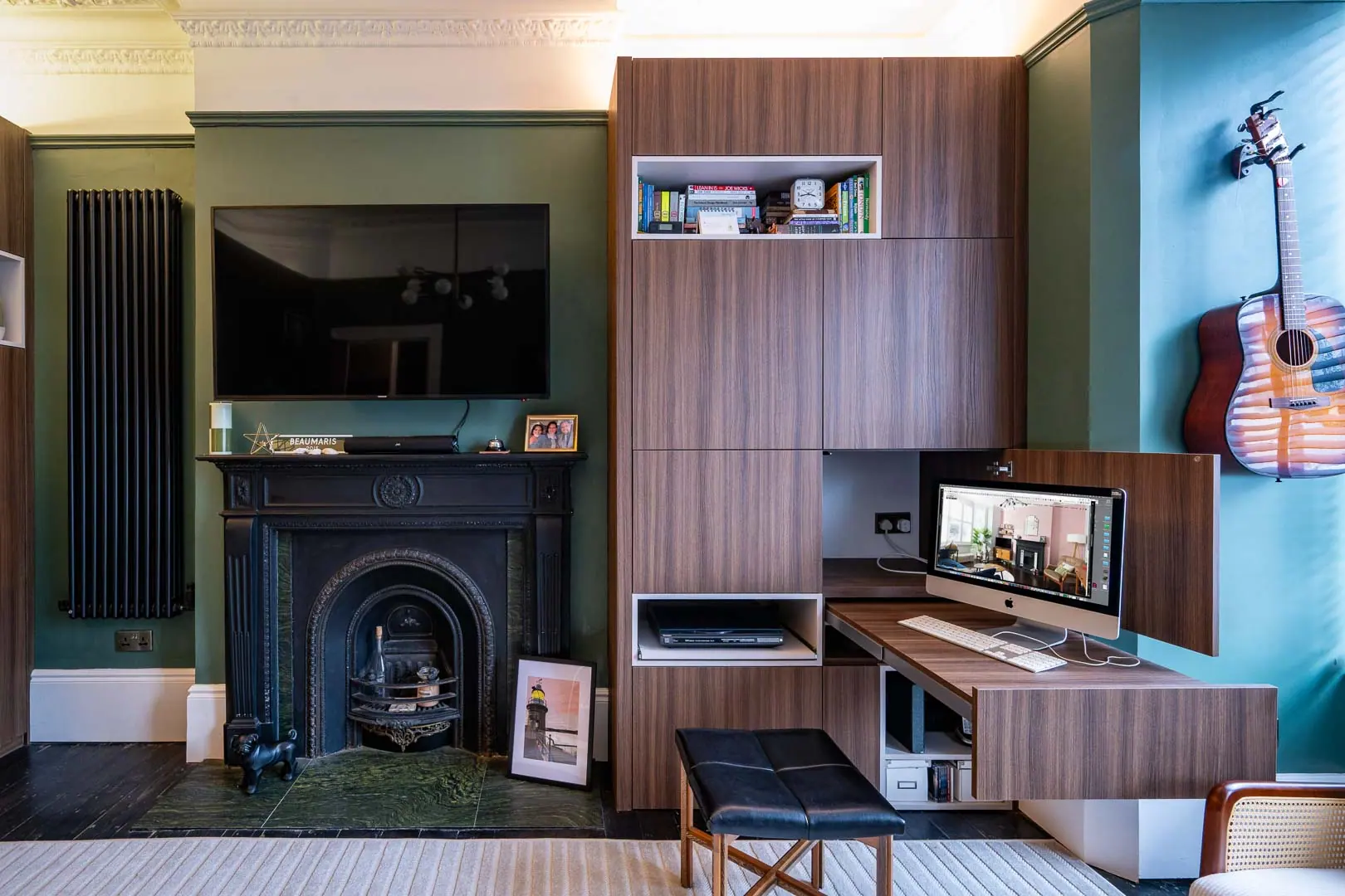 The original fireplace stays, with new joinery built around it for a desk and storage.